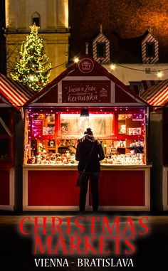 a man standing in front of a christmas market with the words christmas markets written on it