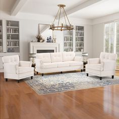 a living room filled with furniture and a fire place in the middle of a room