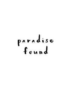 the words paradise found written in black ink