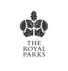 the royal parks logo is shown in black and white, with leaves on it's sides