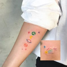 a person with a tattoo on their arm that has planets and stars all over it