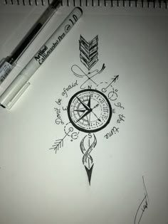 a drawing of a compass and arrows