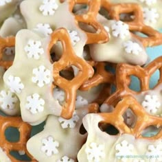 some pretzels with frosting and sprinkles on them