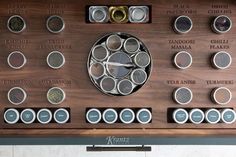 an old wooden clock with many different types of buttons