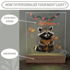 a raccoon is sitting on top of a wooden box with the words, how to personalize your night light?