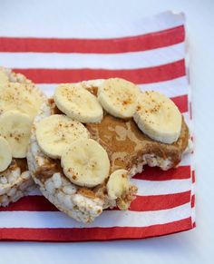 two pieces of banana bread on a red and white napkin