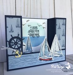 a card with sailboats on the water