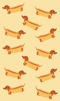 a group of dogs that are in the shape of hotdogs on a yellow background