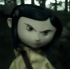 an animated doll with black hair and blue eyes in a yellow dress standing in front of trees