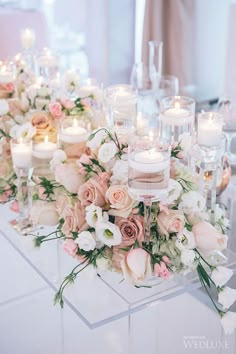 an instagram page with candles and flowers on it