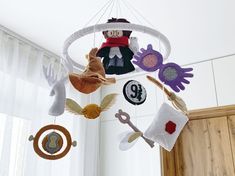 an image of a mobile that is hanging from the ceiling