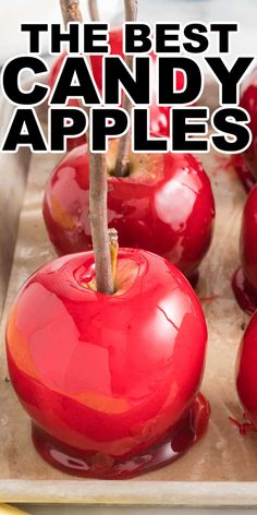 the best candy apples for halloween are red and shiny, with text overlaying them