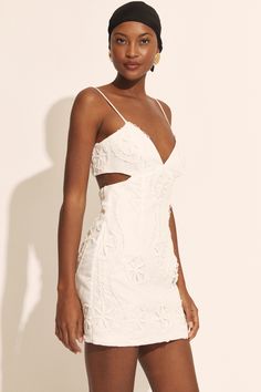 The Loressa Lace Mini Dress features a lace embroidered design in a mini length silhouette with narrow adjustable straps, a v-neckline, side cutouts and a back zip closure. SIZING: True to size  AU: Model wears a size 8 / US: Model wears a size 4.FABRICATION: Main: 100% polyester. Main embroidery: 100% polyester. Lining: 100% cotton. Exclusive of trims. - V-neckline - Narrow adjustable straps - Side cutout details - Centre back invisble zipper - Fully lined Corsets Fashion, Mum Jeans, Orchid White, Day To Night Dresses, White Cocktail Dress, Wide Jeans, Leather Dresses, Party Tops, Lace Mini Dress