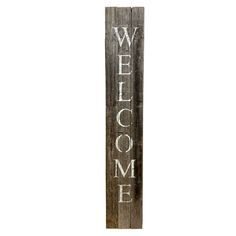 a wooden sign that says welcome on it