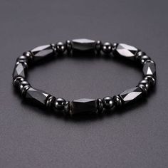 Our beautiful stretchable Hematite Energy Bracelets harnesses the powers of the hematite stone and the various adjoined natural stones. Hematite is a magnetic stone celebrated for its immense grounding and healing properties. When worn in jewelry, hematite is believed to cast a reflective aura around the wearer, protecting them from negative energies, enhancing mental clarity, bolstering self-confidence and purifying the mind, body and soul. See below for the other stones' properties.Suggested S Elegant Adjustable Hematite Stretch Bracelet, Black Hematite Magnetic Bracelets, Black Hematite Magnetic Bracelet, Black Magnetic Hematite Bracelet, Magnetic Hematite Beaded Bracelets Gift, Adjustable Magnetic Hematite Beaded Bracelets, Magnetic Hematite Bracelet, Black Magnetic Hematite Bracelets, Adjustable Magnetic Hematite Bracelets