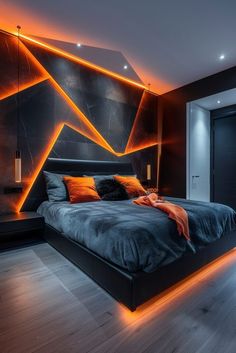 a modern bedroom with black and orange lighting on the walls, bed in foreground