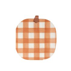 an orange and white checkered pumpkin with a brown leather tag on the top of it