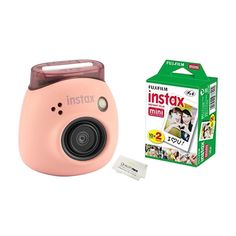 an instax mini camera next to its box