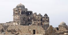 an old building that has been destroyed into pieces