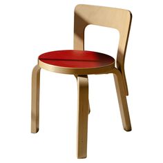 a wooden chair with a red cushion on the seat and backrest, against a white background