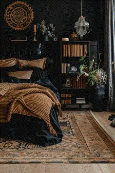 a bedroom with black walls and wooden flooring is pictured in this image, there are bookshelves on either side of the bed