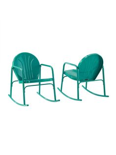 two green rocking chairs sitting next to each other