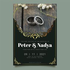 two wedding rings on top of each other in front of a black and gold frame