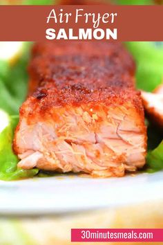 air fryer salmon on a plate with lettuce