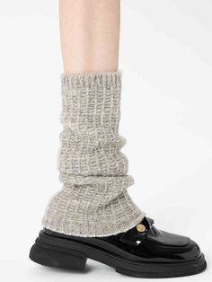 Embrace the chill of autumn and winter with these delightful leg warmers, available in classic shades of white, black, and gray. Crafted from a soft, cozy knit, these leg warmers are designed to keep you warm and stylish all season long. Soft Beige Winter Socks, Fitted Knit Socks For Fall, Gray Mid-calf Socks For Fall, Knit Fitted Socks For Fall, Warm Beige Socks For Winter, Cozy Beige Socks For Winter, Soft Solid Color Leg Warmers For Fall, Winter Soft Knit Fitted Leg Warmers, Casual Gray Knitted Socks