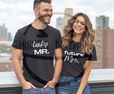 "Celebrate your love story with these sweet matching couples shirts! Featuring the endearing phrases \"Lucky Mr.\" and \"Future Mrs.,\" these tees are a perfect way to showcase your excitement for the journey ahead. Crafted from 100% premium cotton, they offer ultimate comfort and durability for everyday wear. Price is per set of TWO. Key Features: Premium Cotton Material: Made from 100% premium cotton, these tees ensure a soft and comfortable feel all day long. Versatile Style: Unisex sizing available in White or Black, making them a versatile addition to any wardrobe. Perfect Fit: Available in sizes S to XL to ensure the perfect fit for both partners. Care Instructions: Keep your tees looking new by washing and drying inside out, using cold or warm water, mild detergent, and avoiding dir Matching Couples Shirts, Future Mrs Shirt, Engagement Gifts For Bride, Honeymoon Clothes, Valentine Couple, Groom Shirts, Couples Shirts, Wedding Party Outfits, Mrs Shirt