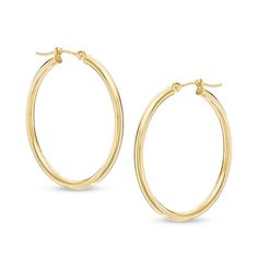 Big on style, these hoop earrings are a great go-with-everything look. Crafted in warm 14K gold, each earring measures 1.0 x 30.0mm. Polished to a bright shine, these earrings secure with latch backs. Everyday Yellow Gold Shiny Hoop Earrings, Timeless 14k Gold Hoop Earrings, 14k Yellow Gold Hoop Earrings With Ear Wire, Timeless Hypoallergenic Hoop Earrings, Yellow Gold Oval Hoop Earrings With Ear Wire, Classic Gold Hoop Earrings With Ear Wire, Classic 14k Gold Hoop Earrings With Shiny Finish, Timeless Yellow Gold Hypoallergenic Hoop Earrings, Timeless Hypoallergenic Yellow Gold Hoop Earrings