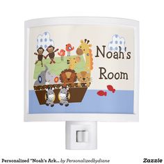 a night light with an animal themed design on it's cover and the words noah's room