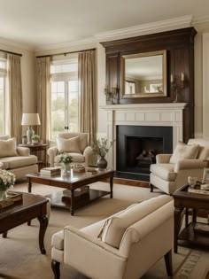 a living room filled with furniture and a fire place