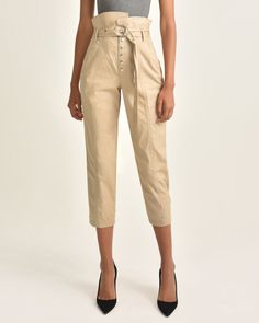 Tried and true, this novelty high-waist pant is our go-to trouser. High-waist fit with asymmetrical waist detail Lace up detail at back bottom hem Slim fit Functional front slant pockets Front snap fly closure Back welt pockets Removable D-ring belt with grommet detail 97% Cotton, 3% Spandex Inseam Length: 24.5" Model is 5’9” and wearing a size 2. This style runs true to size. We would recommend taking your regular size. High Wasted Pants, D Ring Belt, Marissa Webb, Tried And True, D Ring, High Waisted Pants, Welt Pocket, Stretch Cotton, Casual Pants