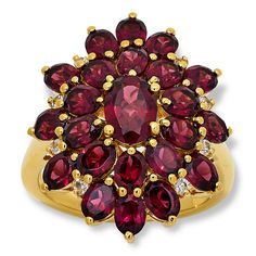 Colleen Lopez Rhodolite Garnet and White Zircon Starburst Ring  Crafted from gold-plated sterling silver, this beautiful starburst-shaped ring features a cluster of rich, rhodolite garnets with sparkling, white zircon accents. Perfect for stylish, everyday wear, this pretty piece will elevate the look of any ensemble!       Approx. 1"L x 3/4"W x 5/16"H; shank 1/16*W     Stamped .925; yellow gold-plating   Stone Information       All sizes and weights approximate     Total Carat Weight: 5.19ct Starburst Ring, Color Bands, Ring Crafts, Rhodolite Garnet, Gold Plated Sterling Silver, Gold Plating, Garnet, Gemstone Jewelry, Jewelry Rings