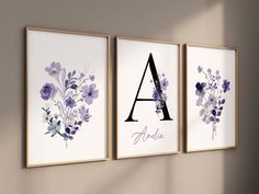 three framed art prints with purple flowers and the letters a, b, and c