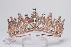 "FAST SHIPPING Beautiful sparkling crystal tiara in rose gold plated. Perfect for your Quinceañera, Wedding, First Communion or Confirmation. It has a loop at the end of each side to attach it in your hair with bobby pins for added security. Approx.  3\" tall  We usually ship within 1-2 business days. Style DAT225RG" Rose Gold Quince Crown, Wedding Crown With Rhinestones And Pinched Shape, Tall Wedding Crown With Rhinestones, Wedding Crown With Rhinestones, Elegant Gold Wedding Crown, Gold Princess Crown For Wedding, Quince Crown, Rose Gold Quince, Sweet 16 Tiara