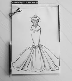 a drawing of a dress on a piece of paper