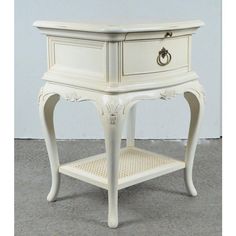 a white table with two drawers on one side and an open drawer on the other