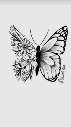 a black and white butterfly with flowers on it