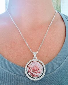 Celebrate the elegance and grace of motherhood with the Mom's Rose necklace, a beautifully crafted two-sided pendant that perfectly symbolizes love and appreciation for the special women in our lives. This exquisite necklace features a 1.35-inch diameter pendant made from high-quality silver-plated aluminum, ensuring it is both lightweight and durable, making it ideal for everyday wear. The pendant is complemented by a 24-inch chain, offering a comfortable fit that pairs well with any outfit. On Rose Necklace, Mothers Love, Double Face, Mother Day Gifts, Pink Rose, Charm Necklace, Timeless Design, Necklace Etsy, Porter