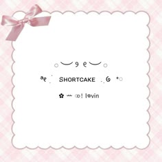 the words shortcake are written in black and white on pink checkered paper with a bow