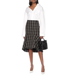 Checked wool midi skirt in black - Balenciaga | Mytheresa Chic Tiered Skirt For Fall, Chic Fall Ruffled Skirt, Chic Ruffled Fall Skirt, Chic Plaid Flared Skirt, Elegant Plaid Skirt For Work, Plaid Skirt For Work In Fall, Plaid Skirt For Fall Workwear, Chic Pleated Plaid Skirt, Fall Workwear Gathered Skirt