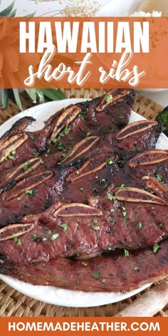 the hawaiian short ribs are served on a white plate with garnish and parsley