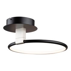 a black and white circular light fixture on a white background with the lights turned off