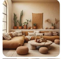 a living room filled with lots of furniture and potted plants on top of it