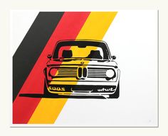 a car is shown on a multi - colored striped background with black, yellow, and red stripes