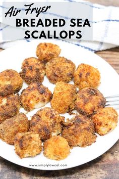 air fryer breaded sea scallops on a white plate with a fork