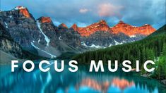 the words focus music are in front of a mountain range and lake with pine trees