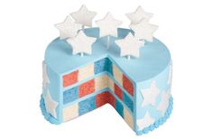 a blue cake with white stars on top